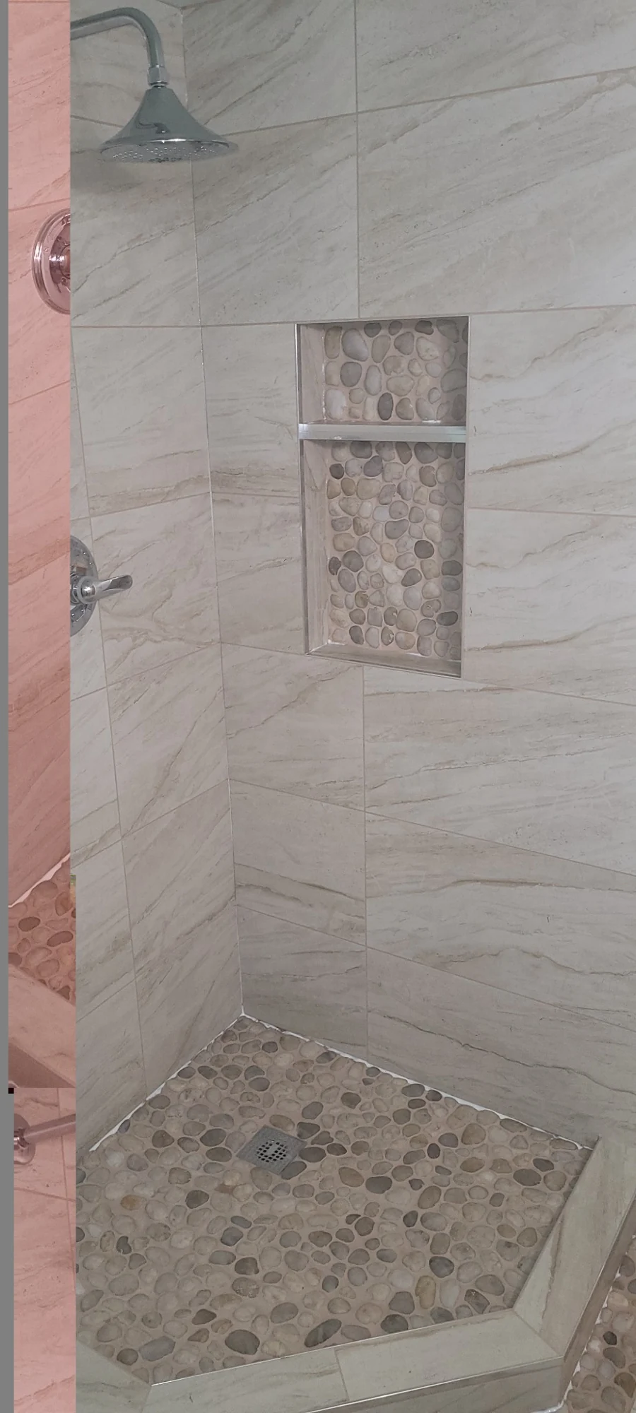 Pebble shower floor and matching recessed niche detail