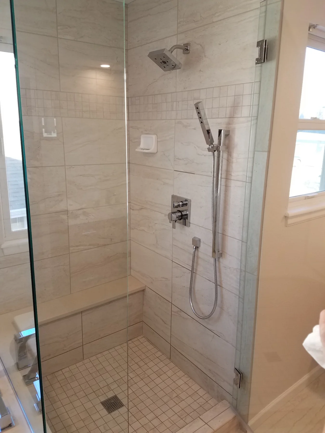 Custom shower fixture and tile detail