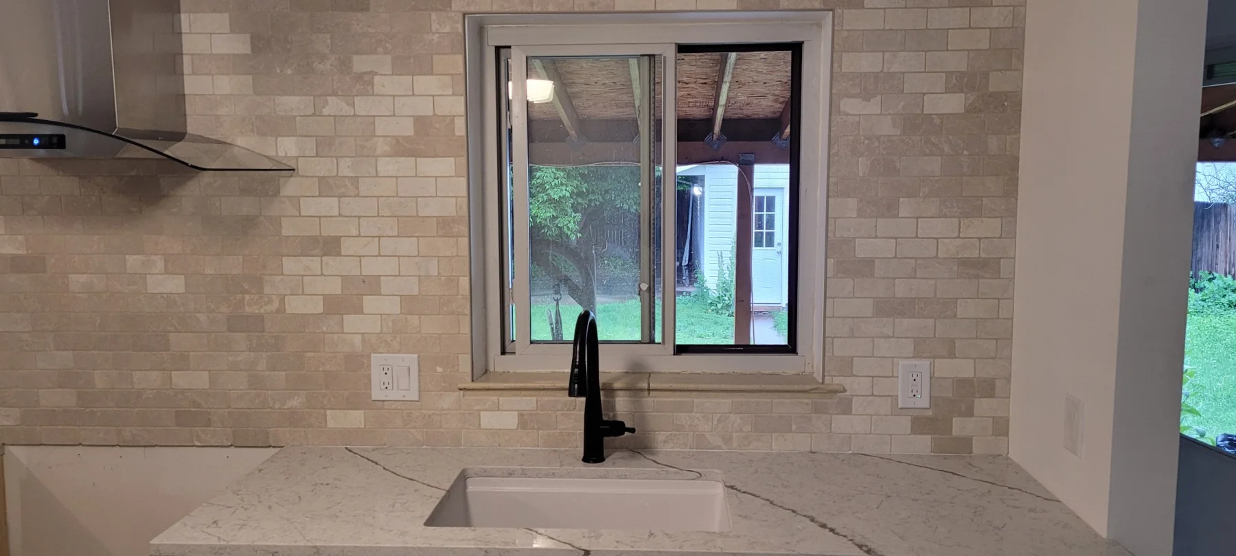 Kitchen sink and backsplash